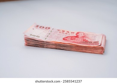 Large Stack of New Taiwan Dollar 100 Banknotes, Symbolizing Financial Freedom and Success