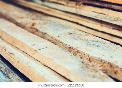Large stack of wood planks - Shutterstock ID 521191630