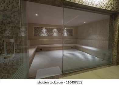 Large Steam Room With Glass Door In Health Spa At A Luxury Hotel