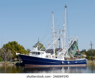 A Large Steel Shrimp Trawler Boat At Dock In Bayou Lafourche In South Louisiana.