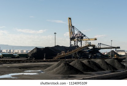 Large Stockpile Of Coal In Tarragona Port Terminal, Ready For Railroad Transportation To A Thermal Power Plant