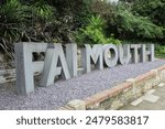 Large stone Falmouth University sign