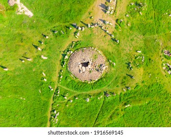 Large Stones In A Field With Round Holes In Karahunj - Armenian Stonehenge, Zorats Karer, Armenia Top View