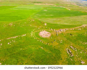 Large Stones In A Field With Round Holes In Karahunj - Armenian Stonehenge, Zorats Karer, Armenia Top View