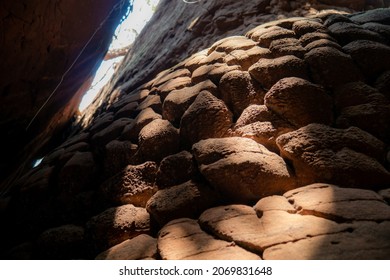 Large stones that resemble snake scales. This is Naka Cave, Bueng Kan Province. Thailand - Shutterstock ID 2069831648