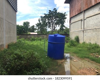 Large Storage Bin, Placed On The Floor Between The Walls.