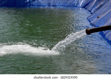 Large Store Pool Of Temporary Water For Supplying Water For Irrigation In Field In Rural  Area (Temporary Water Bodies For Supply Of Water For Irrigation)