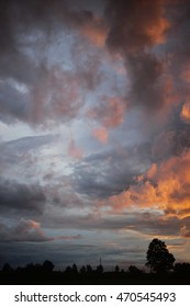 Large Storm Clouds Over A Field