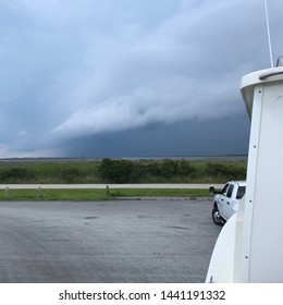 A large storm system approaching over the water