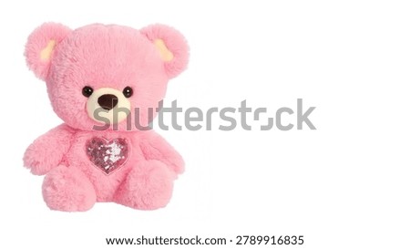 A large stuffed bear sits alone with a sparkling heart in its chest. The bear appears soft and colorful, suited for children. It can serve as a gift for special occasions.