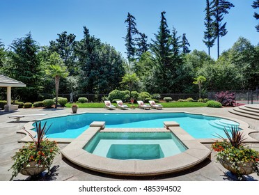 Large Swimming Pool Of American Suburban Luxury House. Northwest, USA