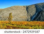 The large tailings pile from the abandoned asbestos mine at Cassiar, British Columbia