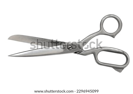 Large tailor's scissors open from white metal, isolate on a white background