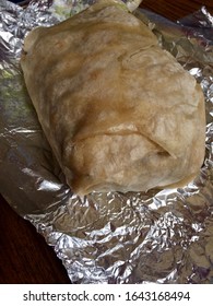 Large Take Out Burrito On Foil