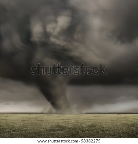 A large tornado working its way across fields.
