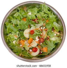 large tossed garden salad from above in a reflective silver bowl