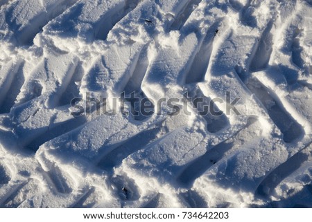 Similar – snow tracks Winter Ice