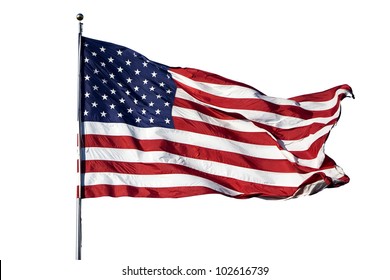 Large U.S. Flag "Old Glory" blowing in a strong wind on a cloudless day - isolated on white background