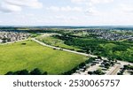 Large vacant land near new development residential neighborhood houses in New Braunfels, suburbs San Antonio, master planned community to grow along Rueckle Road and Morningside Drive, aerial. USA