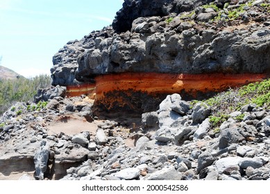 Large Vein Of Iron Ore Running Through A Large Rock.