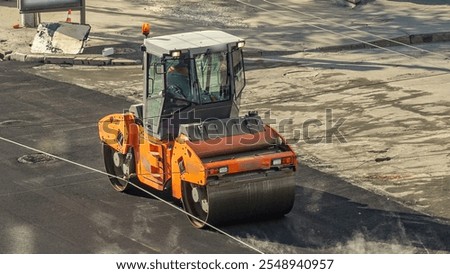 Large view on the road rollers working on the new road construction site timelapse. Close up view with asphalting works