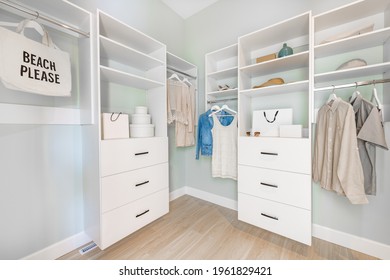 Large Walk In Closet With Clothing