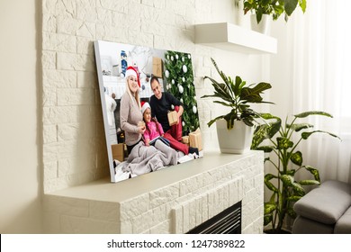 large wall canvas portrait of her family with young children