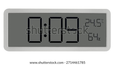 Large wall clock with white digits, alarm function, and temperature measurement. On a white background in isolation.