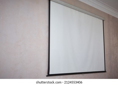 Large Wall Projector Screen On The Wall.