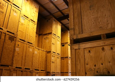 Large Warehouse of Big Wood Storage Crates - Shutterstock ID 627439256