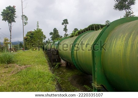 large water pipe to carry water from the source to the hydroelectric turbine