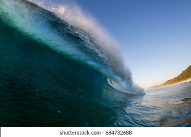 Large Wave Breaking On Beach In Africa