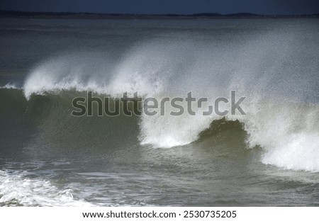 Large waves with spume created by strong winter winds