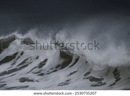 Large waves with spume created by strong winter winds
