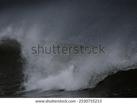 Large waves with spume created by strong winter winds