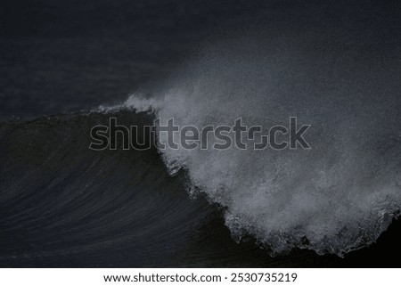 Large waves with spume created by strong winter winds