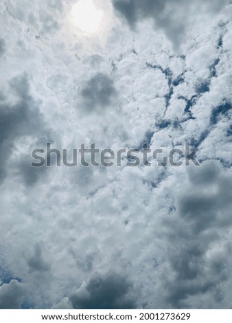A large white Cirrocumulus clouds hovering in the air In the blue sky at Bangkok, Thailand. Nofocus