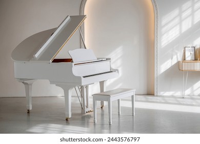 Large white concert grand piano in a sunny interior - Powered by Shutterstock