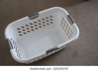 Large white empty laundry basket - Shutterstock ID 2251592737