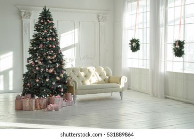 Large White Living Room With A Vintage Sofa And A Large Christmas Tree With Gifts And Large Panoramic Windows