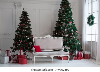 Large White Living Room With A Vintage Sofa And A Large Christmas Tree With Gifts And Large Panoramic Windows