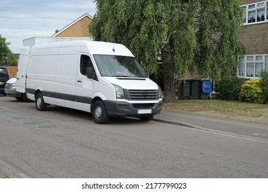 A large white removal van parked in the road.