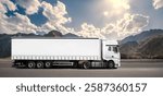 A large white semi truck is driving down a road. The sky is cloudy and the road is empty