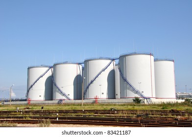 Large white tanks for petrol and oil