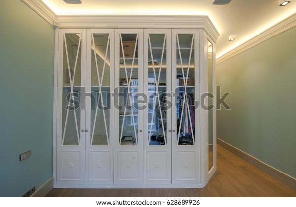 Large White Wooden Wardrobe Glass Doors Royalty Free Stock