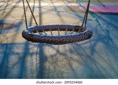 Large Wicker Swing In The Courtyard Of A Residential Building. Yard Improvement