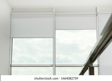 Large Window With Open Roller Blinds Indoors