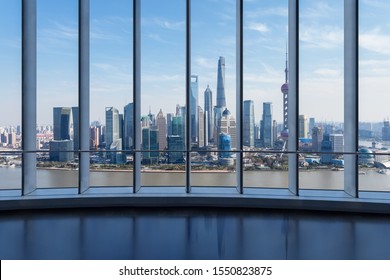 large window scene with shanghai cityscape against a sunny sky