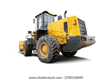 A large yellow construction machine stands prominently against a clean, isolated white background. This powerful equipment is ideal for various design applications.