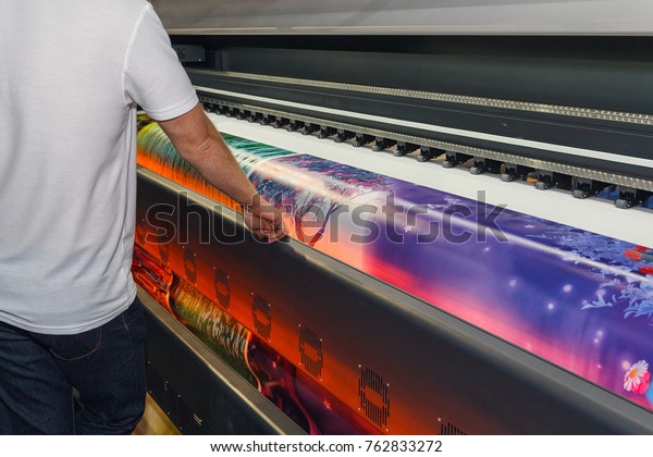 Large-format printing machine in the printing\
house. Industry